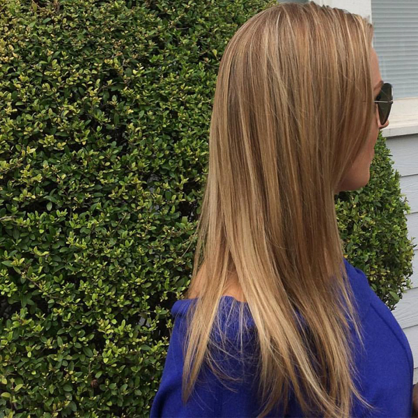 women's cut with long blonde layers